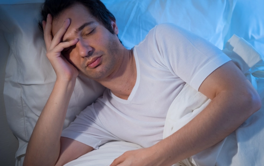 adult experiencing trouble sleeping and fatigue upon waking
