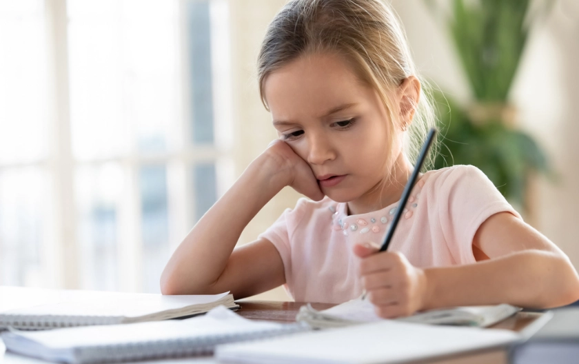 angry, depressed child struggling with homework chronic worry and anxiety in children